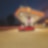 A red BWM M3 parked on a Shell Forecourt during dusk