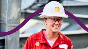 Workers discussing and smiling