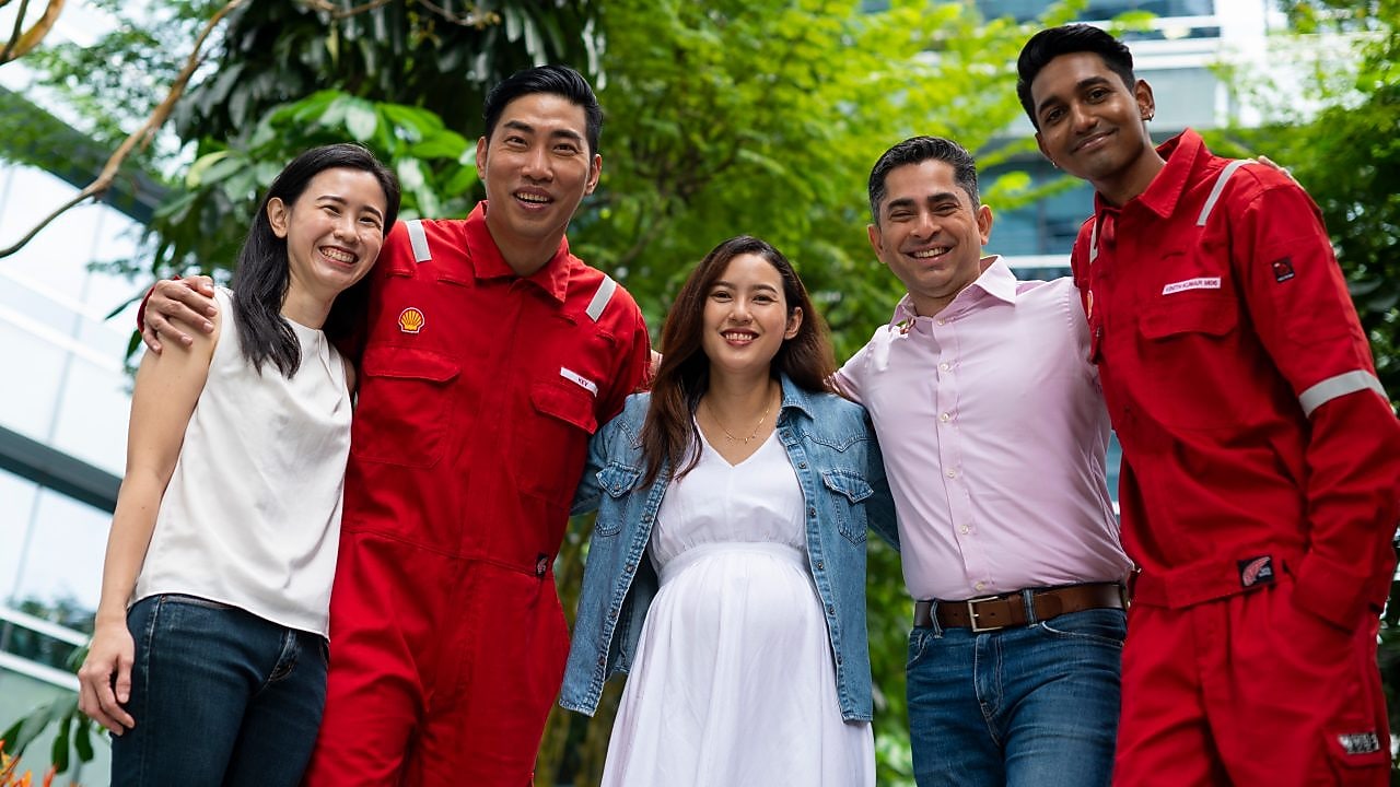 employees posing for a photo