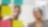 Woman and man reading adhesive notes