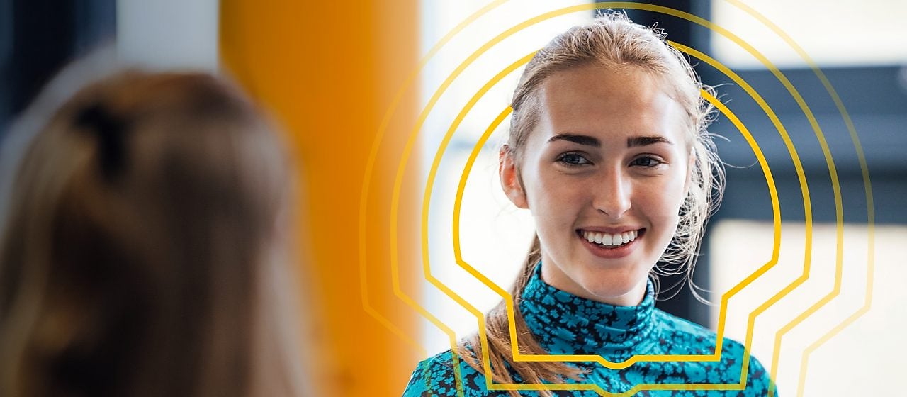 School Student Smiling at Friend in a working environment