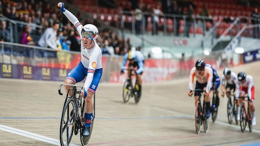 Winner of professional cyclists on a track finish line