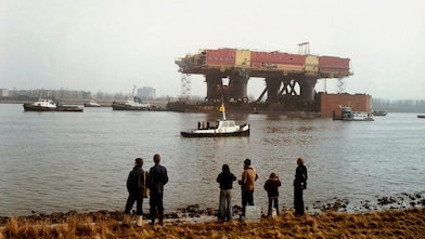 People standing near the sea