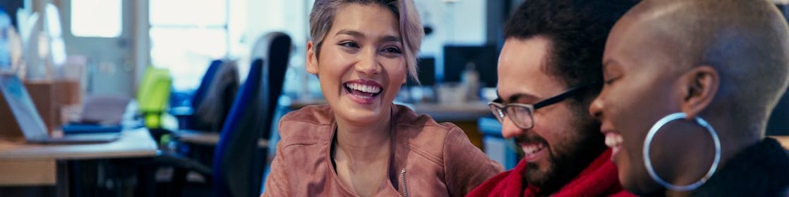 People laughing in a meeting