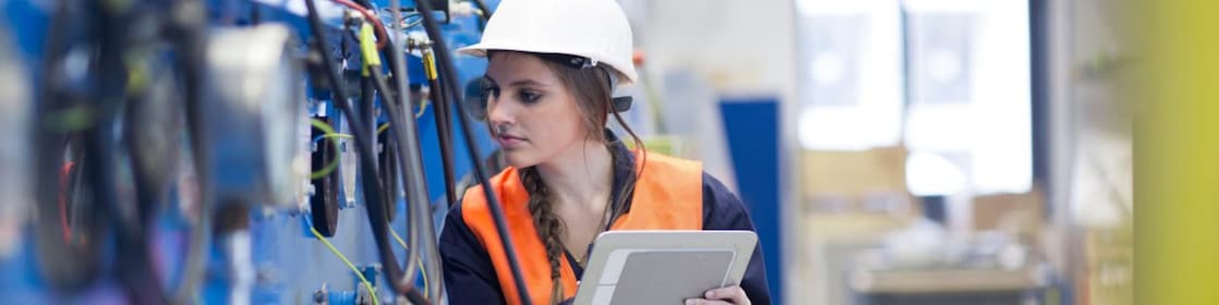 Factory worker running inspections