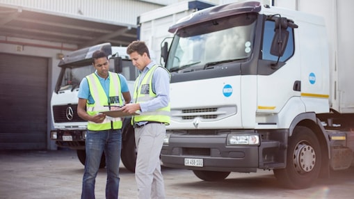 Workers loading a lorry