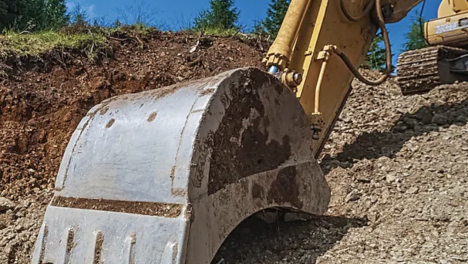 A digger, digging up the ground