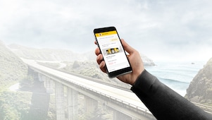 man holding a phone in his hand