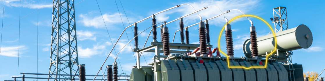 Pylon with a Transformer and the Shell Diala logo over it