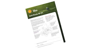 Tractor spraying crops