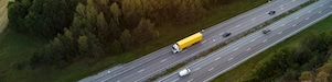 birdseye view of fleet lorries, cars and vans on a motorway