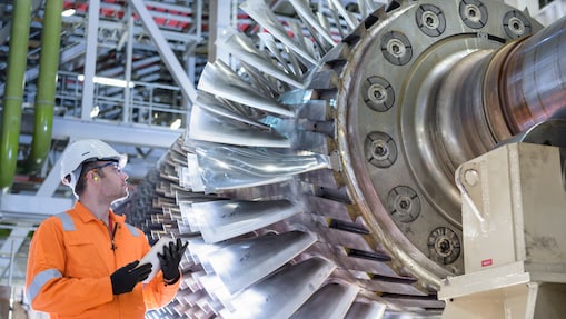 Engineer checking on a turbine