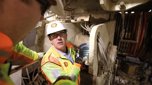 Shell engineer inspecting a mining equipment