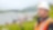 Shell engineer in hard hat smiling over river