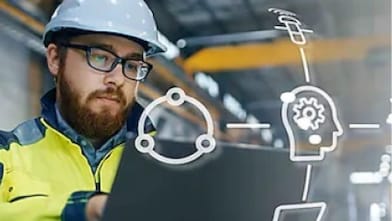 Shell employee studying a tablet
