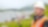 Shell engineer in hard hat smiling over river