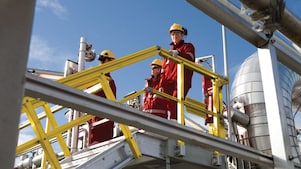 Employees working on gas field