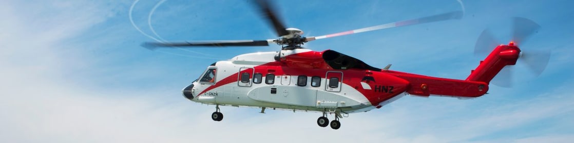 Helicopter landing at rig helipad