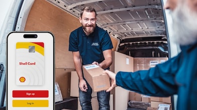 Delivery worker inside van handing parcel to customer, with smartphone screen overlay showing Shell Card app login interface.