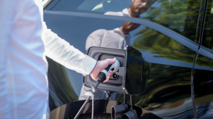 Man fueling car