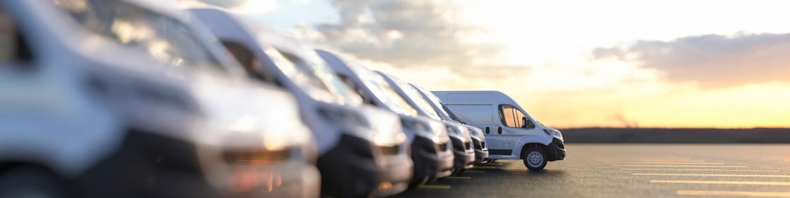 Row of new vans in a parking bay
