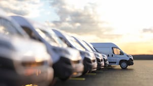 Row of new vans in a parking bay
