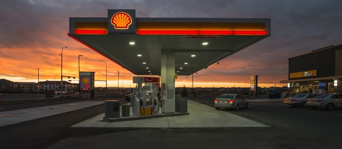 A Shell station during sunset