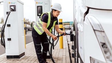 Women charging truck