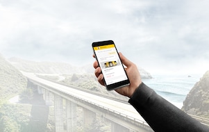 man holding a phone in his hand