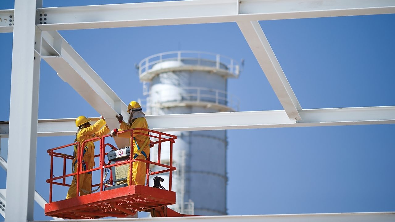 Engineers on crane maintenance work