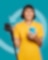 Woman using charge card at a Shell Recharge Station