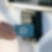 Charge card being tapped against Recharge machine