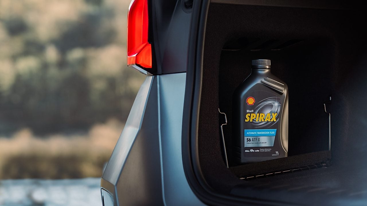 Opening Shell Coolant bottle front of an engine