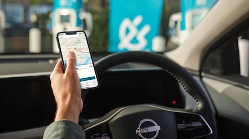 Driver parked at a Charge Point having used the 'Find an EV Charge Point feature'.