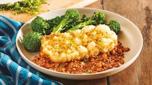 Co-op cottage pie served on a plate with broccoli.