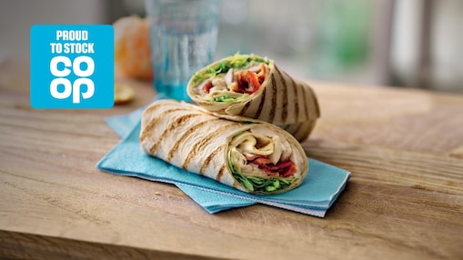 Image of wrap on blue napkin with co-op logo