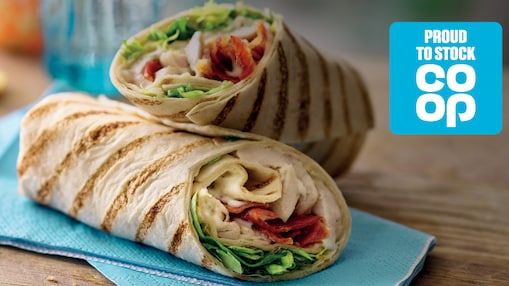 Image of wrap on blue napkin with co-op logo